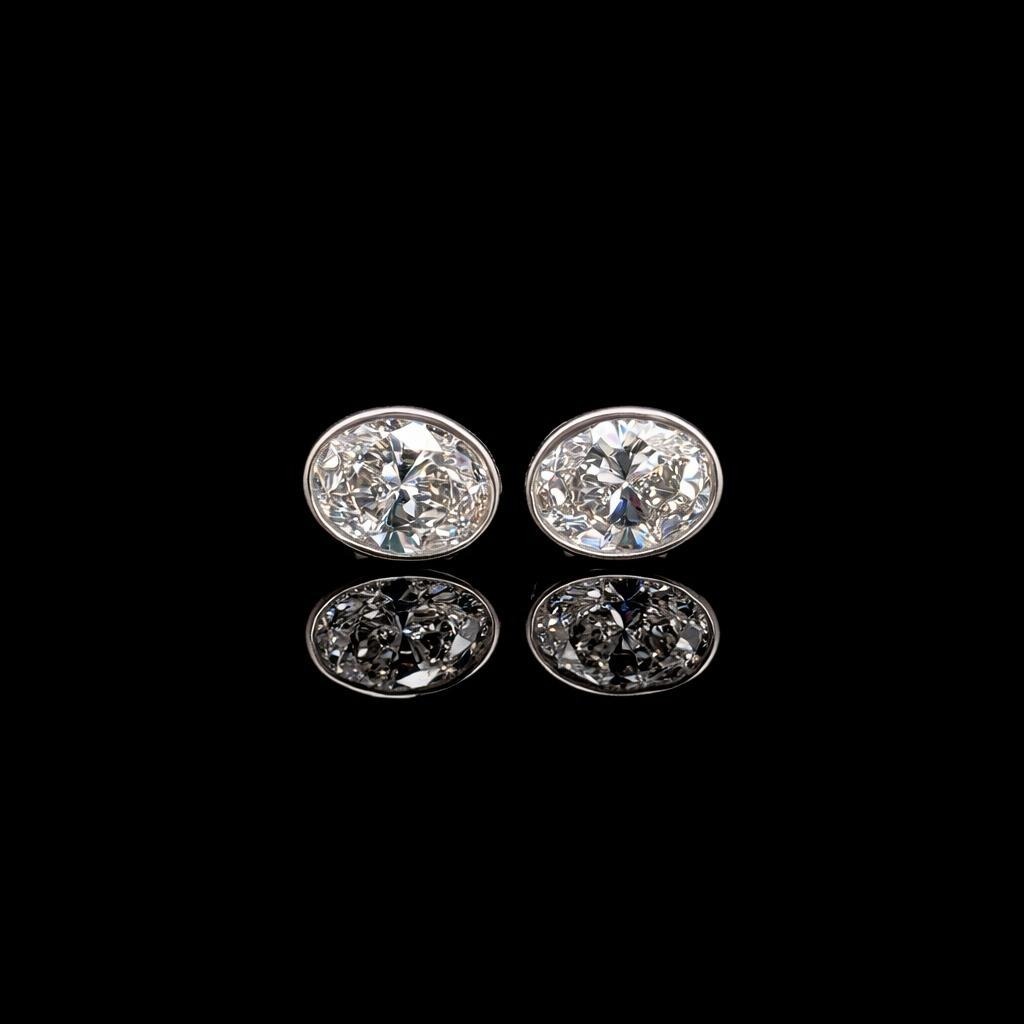 Oval Diamond Bezel Stud Earrings in 14k White Gold