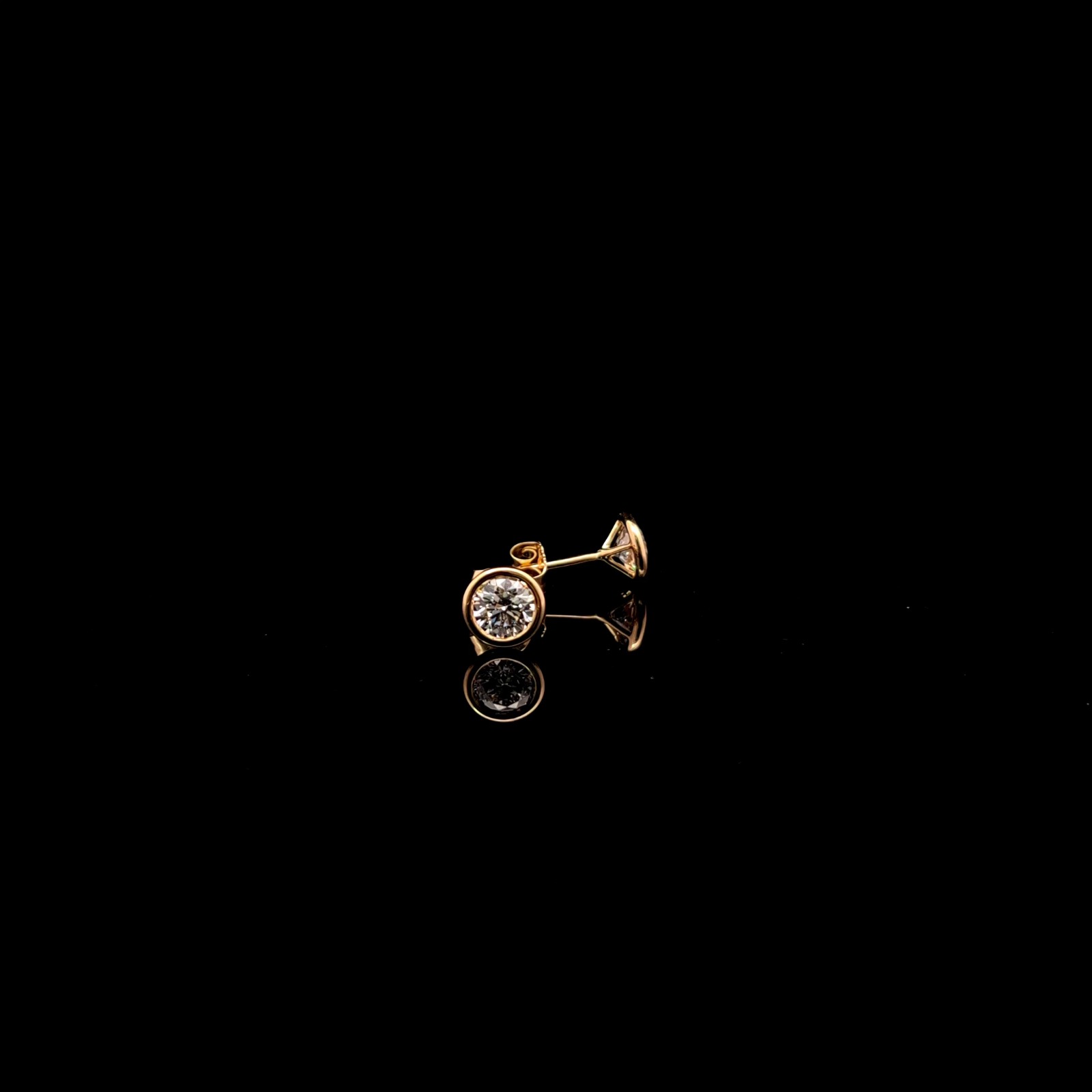 Round Diamond Bezel Stud Earrings in 14k Yellow Gold